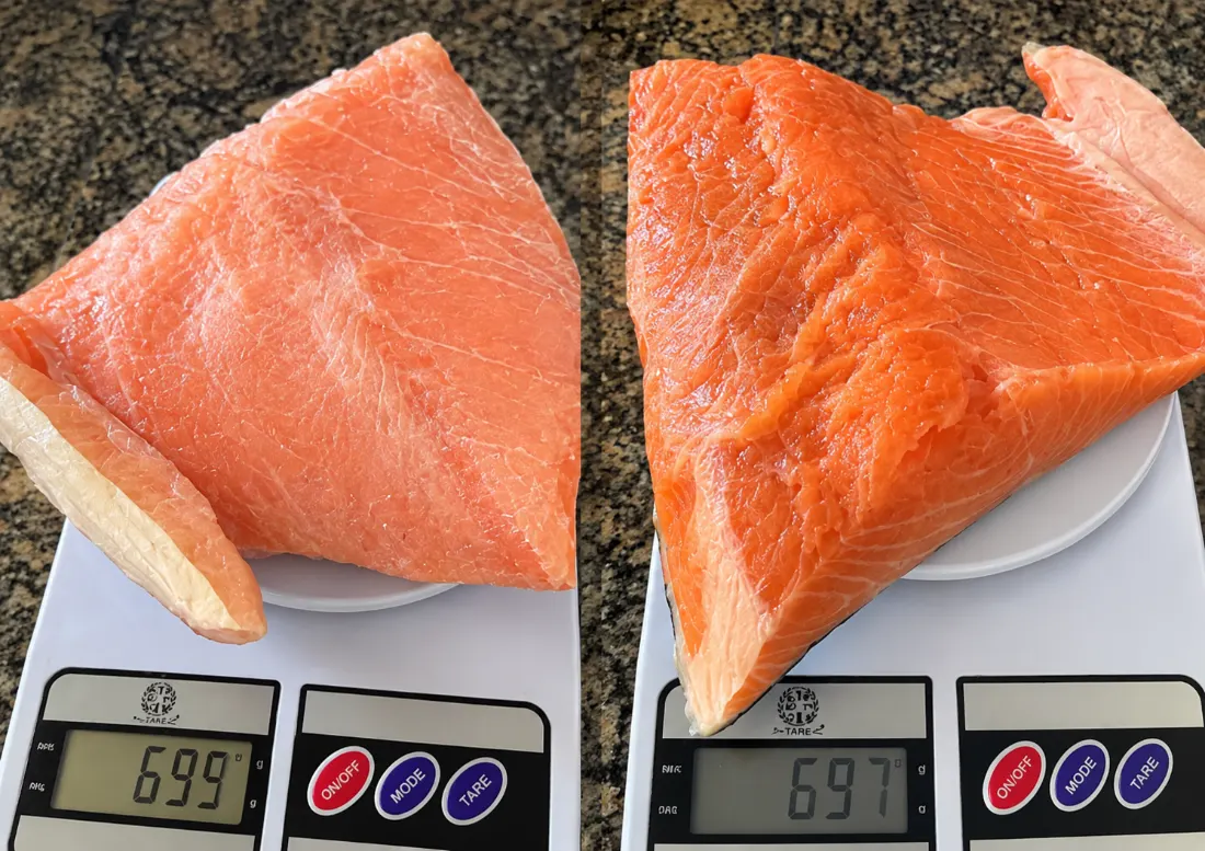 Filés de salmão pesados na balança